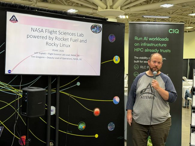 Jeff Triplett opens the NASA Flight Sciences Lab talk at the CIQ booth at PEARC26